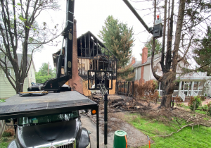 removing burned trees using cranes